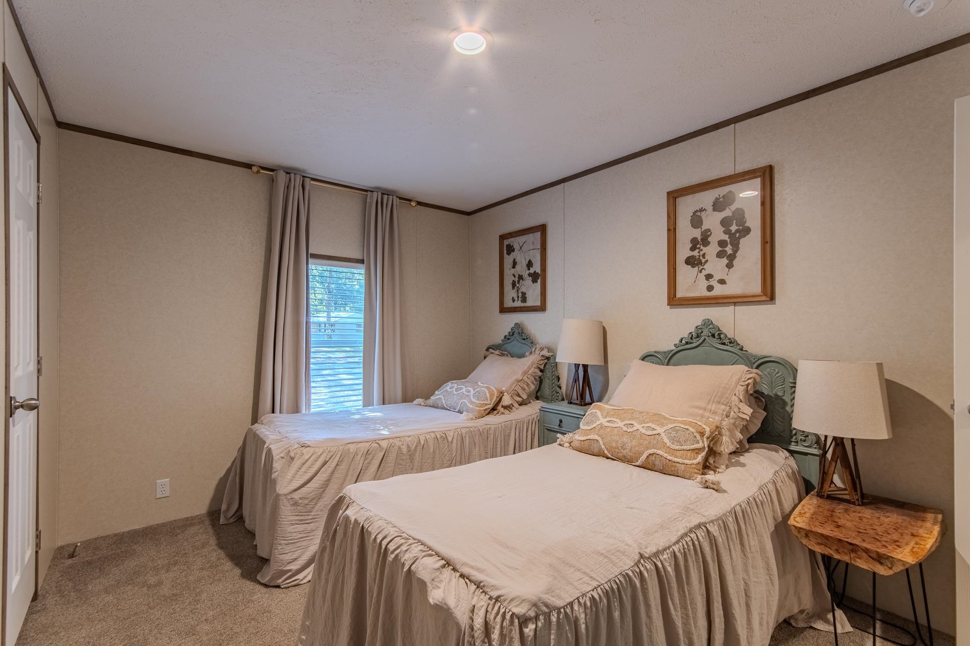 30 Chardonnay Way Counce, TN 38326 - Photo 27 of 37 a bedroom with two beds and a window