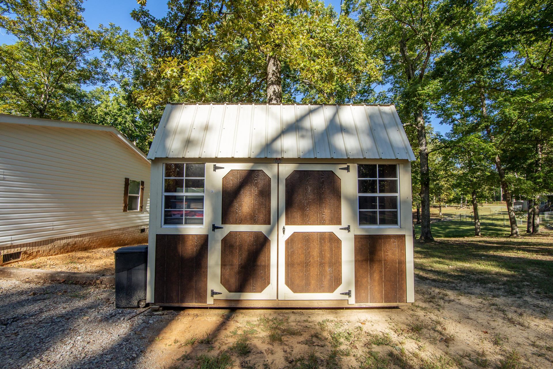 30 Chardonnay Way Counce, TN 38326 - Photo 31 of 37 a view of backyard with wooden fence