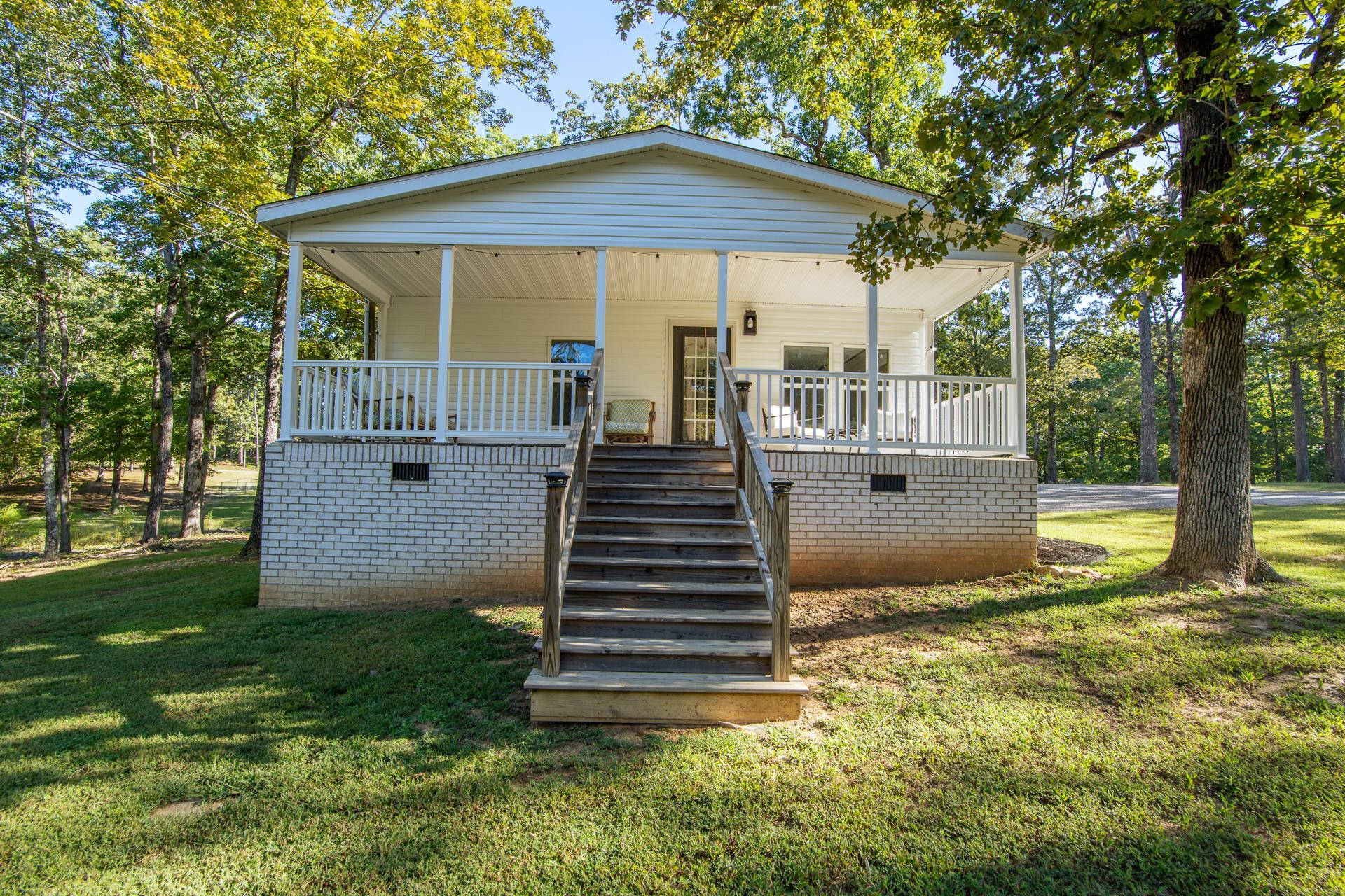 30 Chardonnay Way Counce, TN 38326 - Photo 34 of 37 a view of a house with backyard and garden