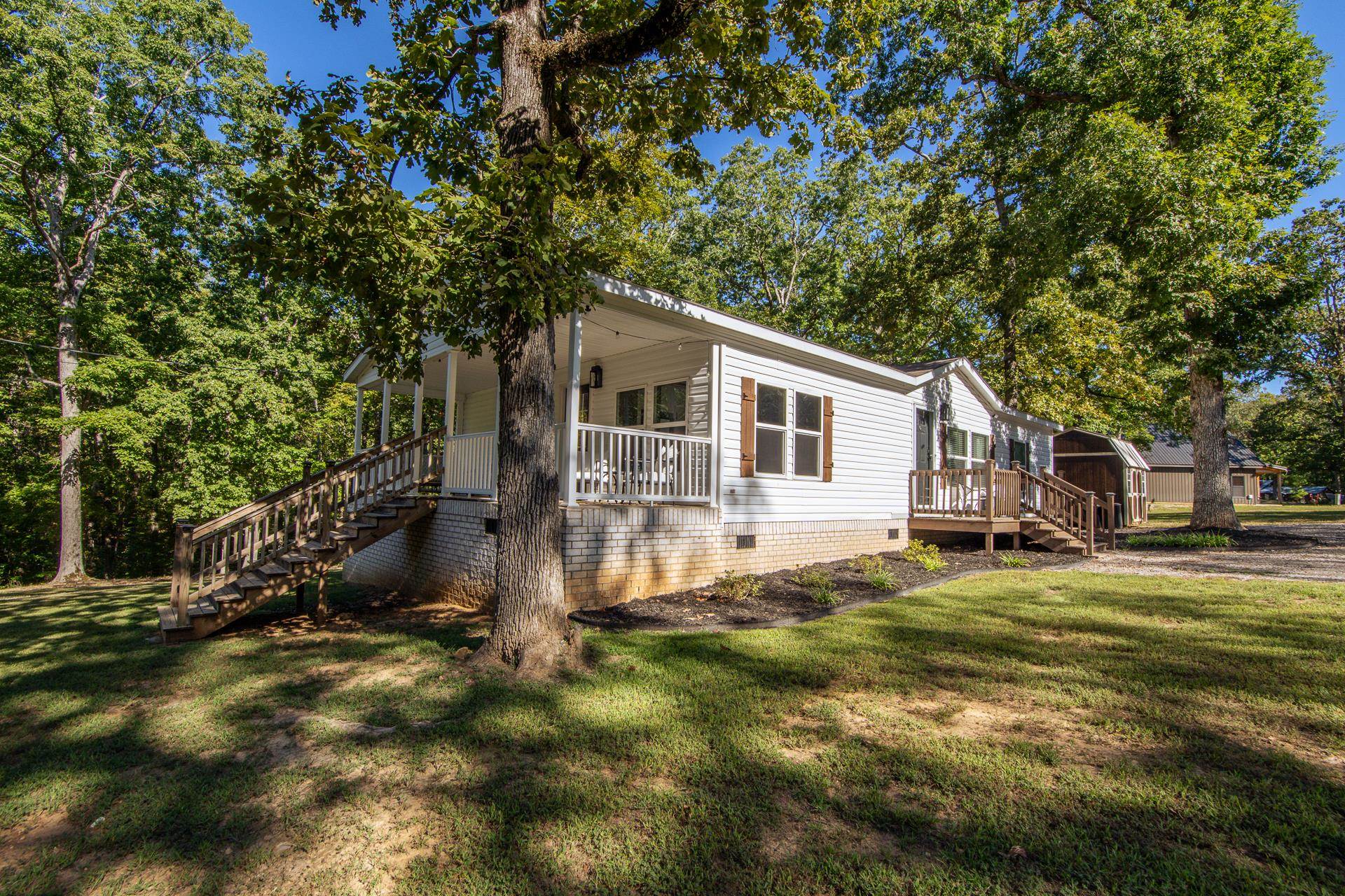 30 Chardonnay Way Counce, TN 38326 - Photo 37 of 37 a view of a house with a yard