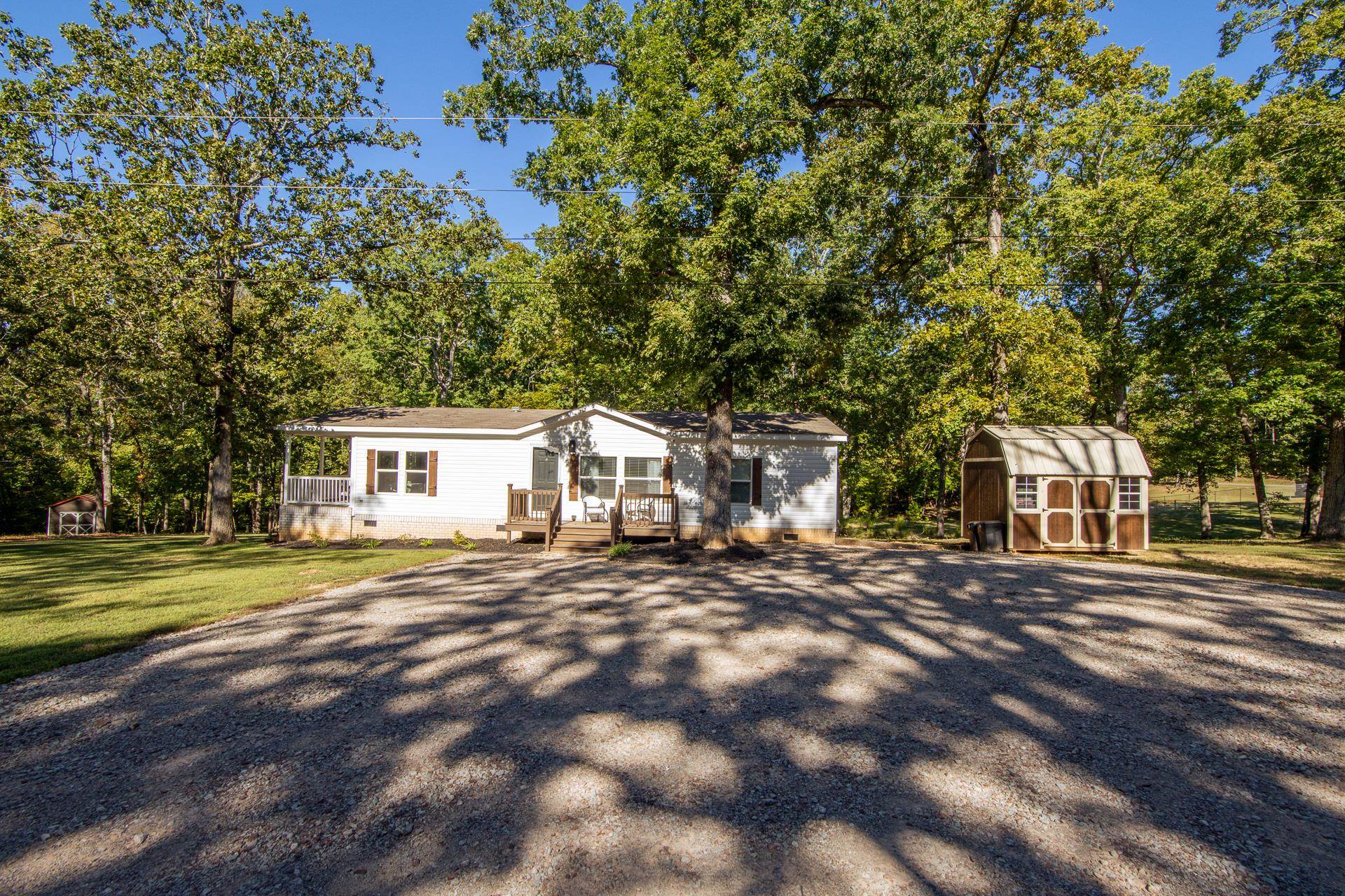 30 Chardonnay Way Counce, TN 38326 - Photo 6 of 37 a view of a house with a outdoor space