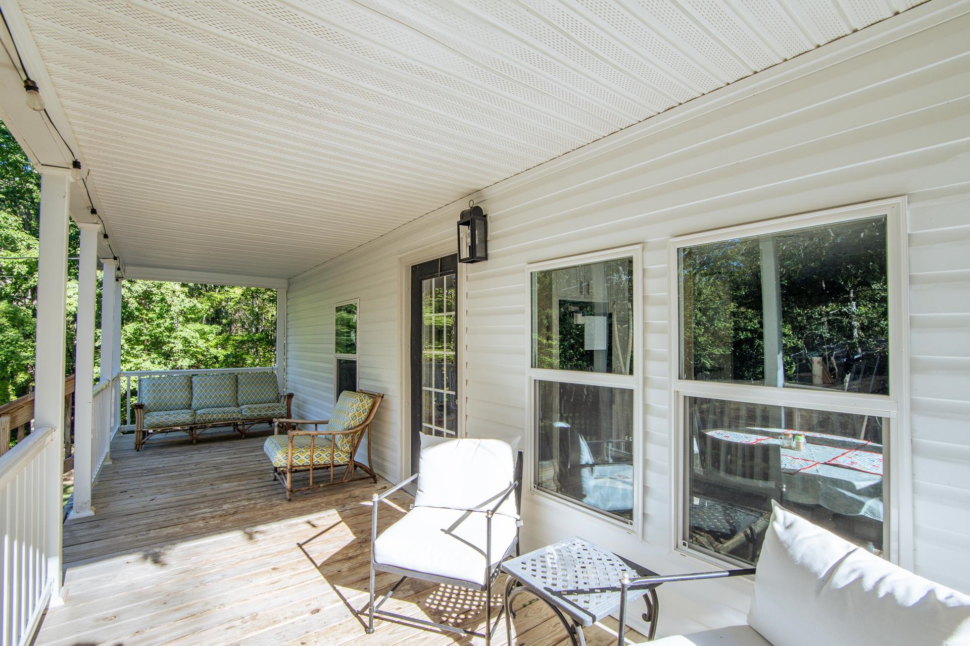 30 Chardonnay Way Counce, TN 38326 - Photo 9 of 37 a view of a patio with table and chairs and potted plants