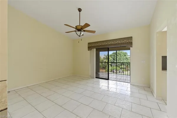 a view of room with a ceiling fan
