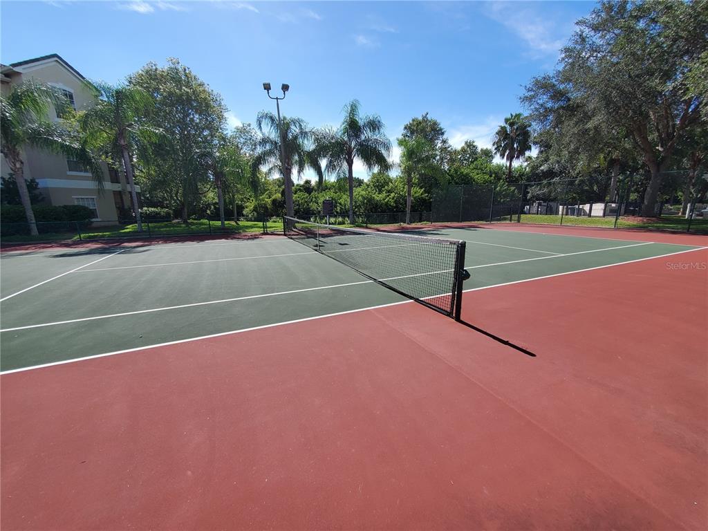5174 Northridge Road, Unit 209 Sarasota, FL 34238 - Photo 24 of 25 a view of a tennis court
