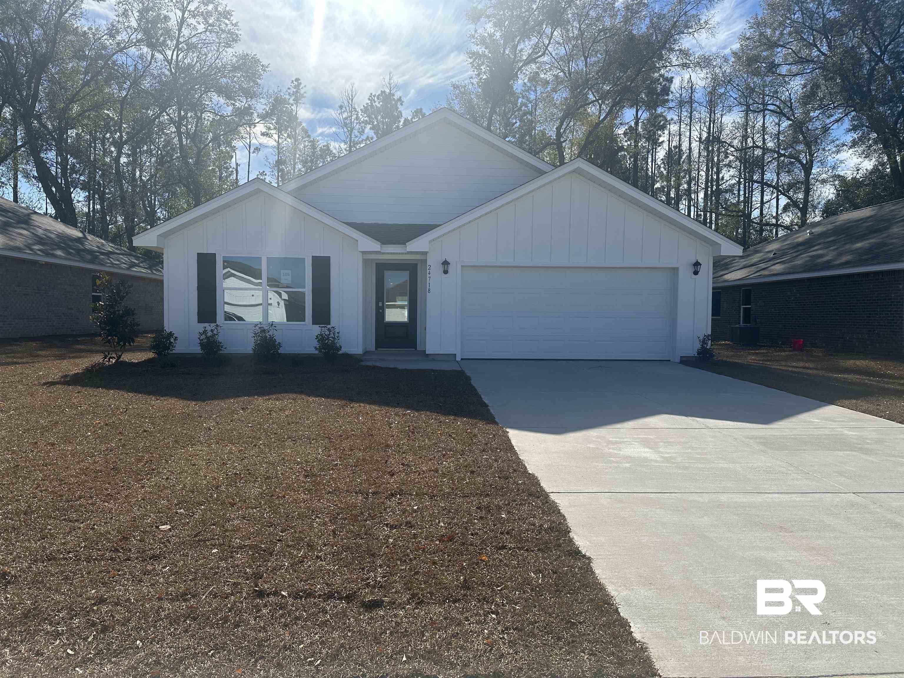 24718 Ponder Loop Loxley, AL 36551 - Photo 1 of 31 Single story home featuring central AC unit and a garage