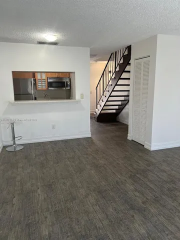 a view of an entryway with stairs