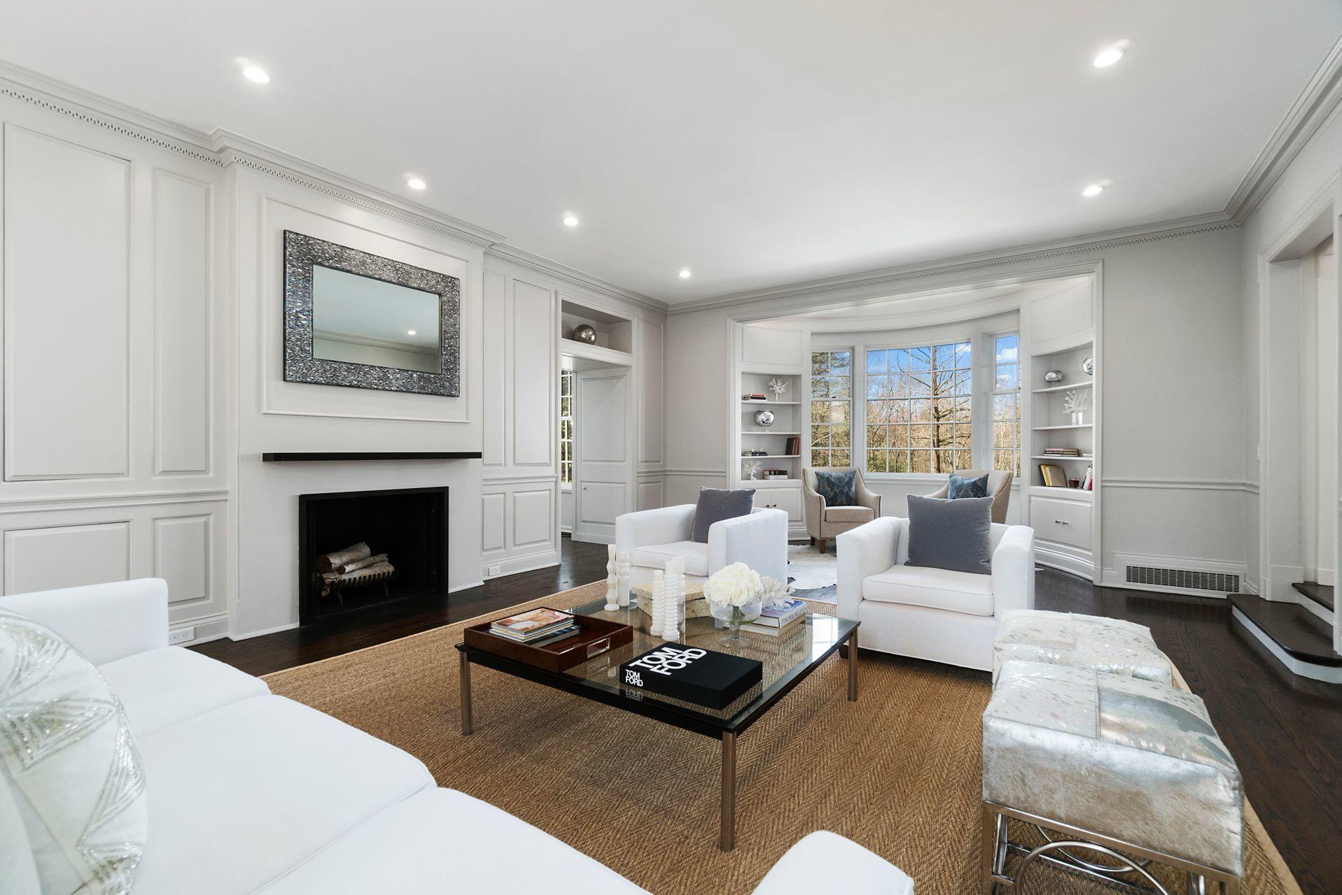 1102 Oenoke Ridge New Canaan, CT 06840 - Photo 13 of 49 a living room with furniture and a fireplace
