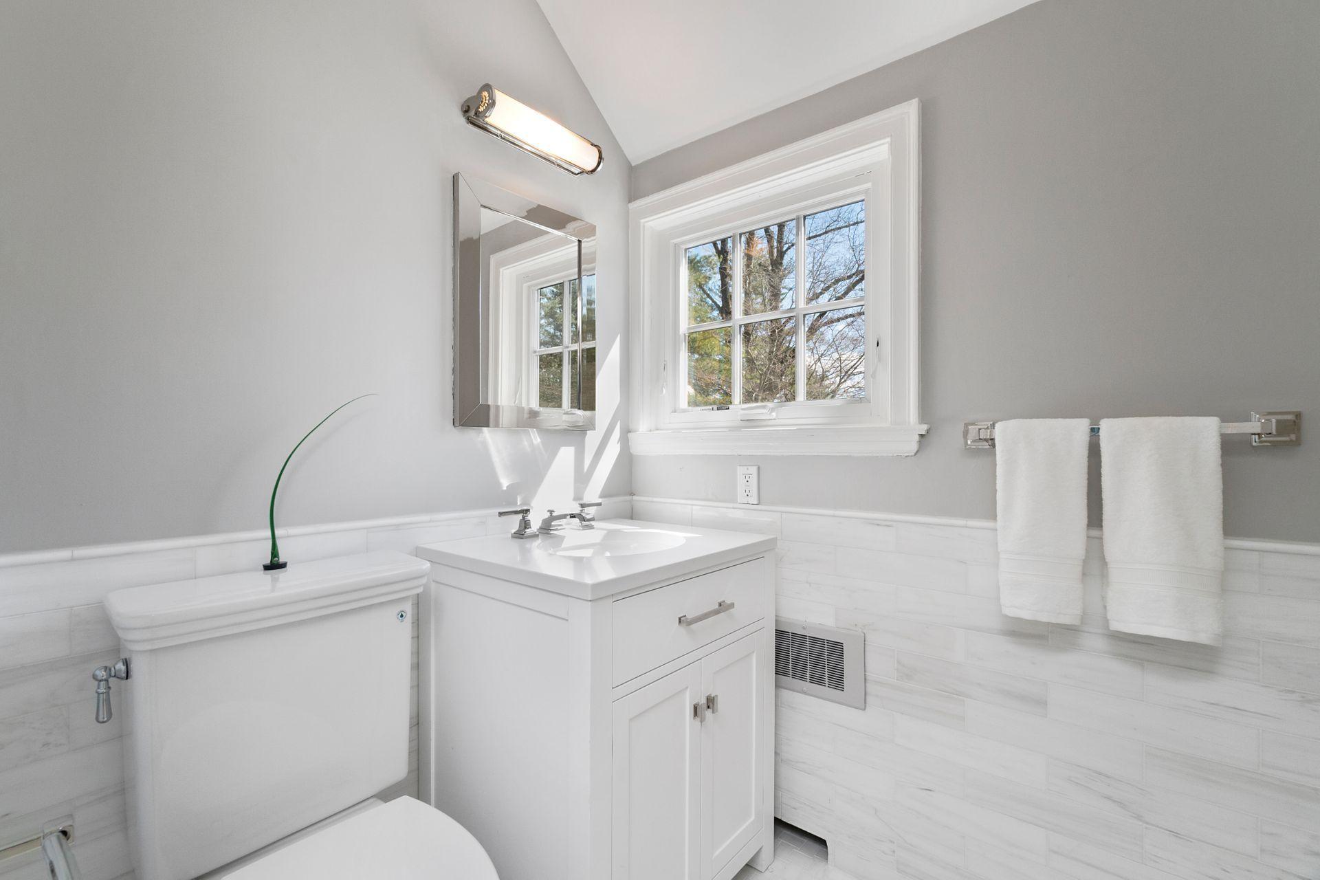 1102 Oenoke Ridge New Canaan, CT 06840 - Photo 28 of 49 a bathroom with a sink toilet and tub