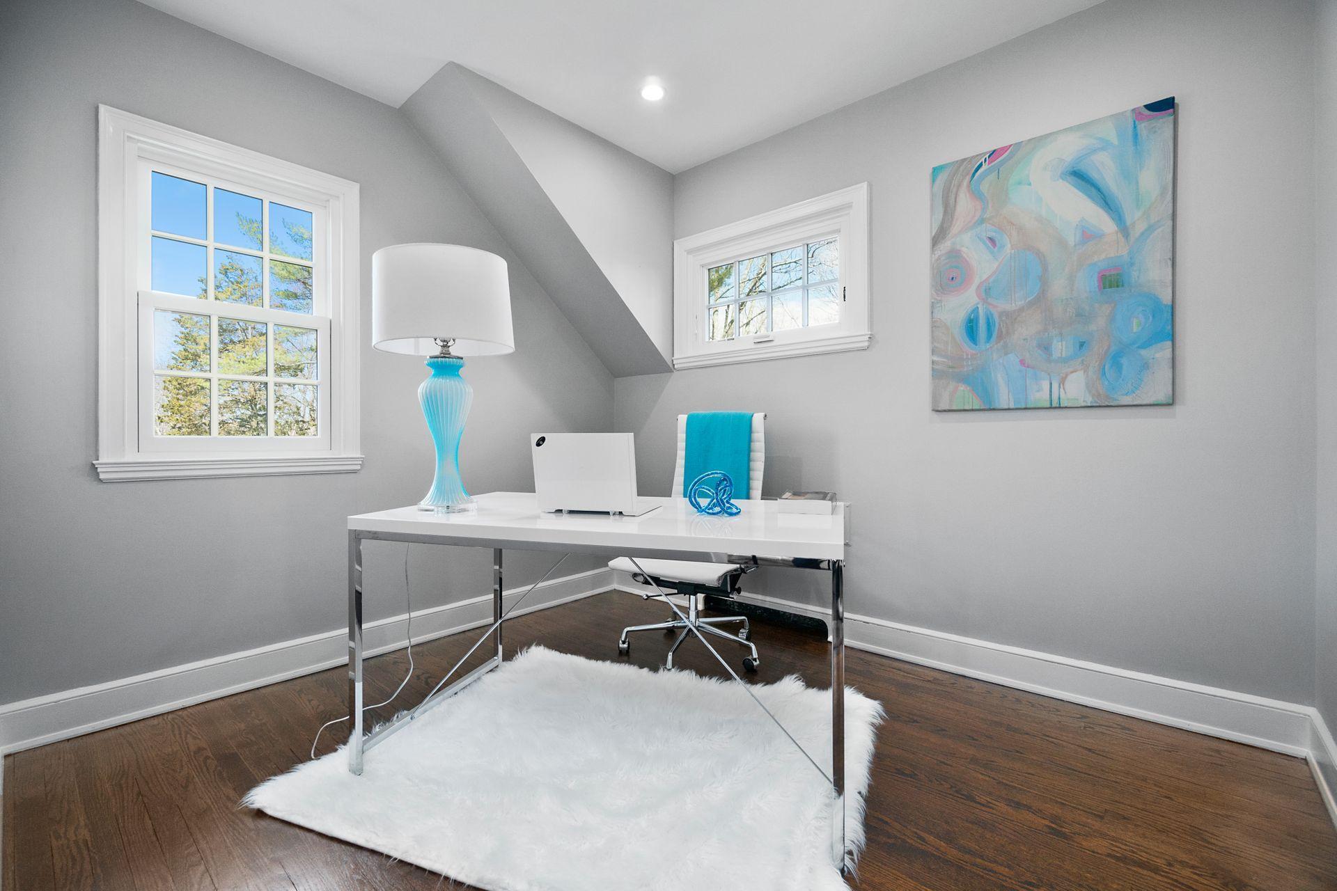 1102 Oenoke Ridge New Canaan, CT 06840 - Photo 29 of 49 a view of a workspace with furniture and a window