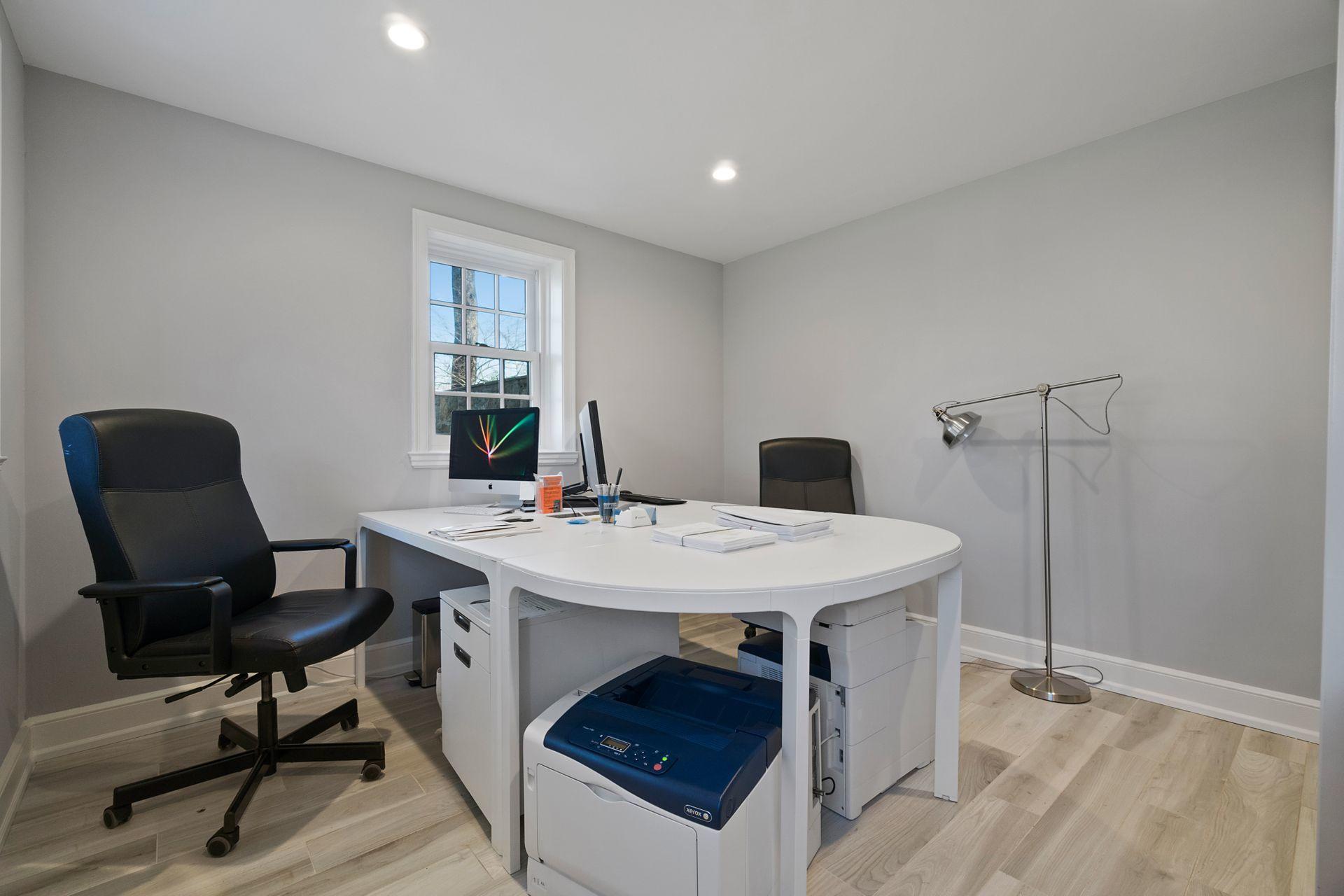 1102 Oenoke Ridge New Canaan, CT 06840 - Photo 37 of 49 a view of a workspace with furniture