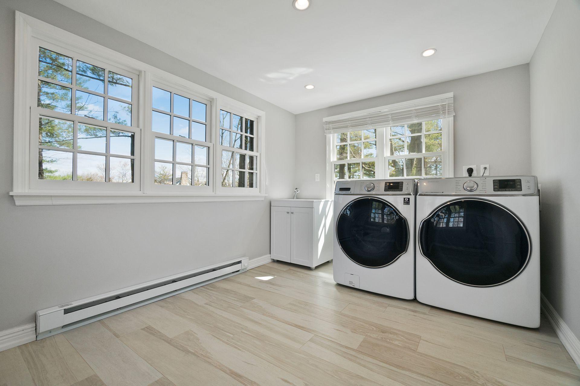 1102 Oenoke Ridge New Canaan, CT 06840 - Photo 38 of 49 a view of a room with washer and dryer