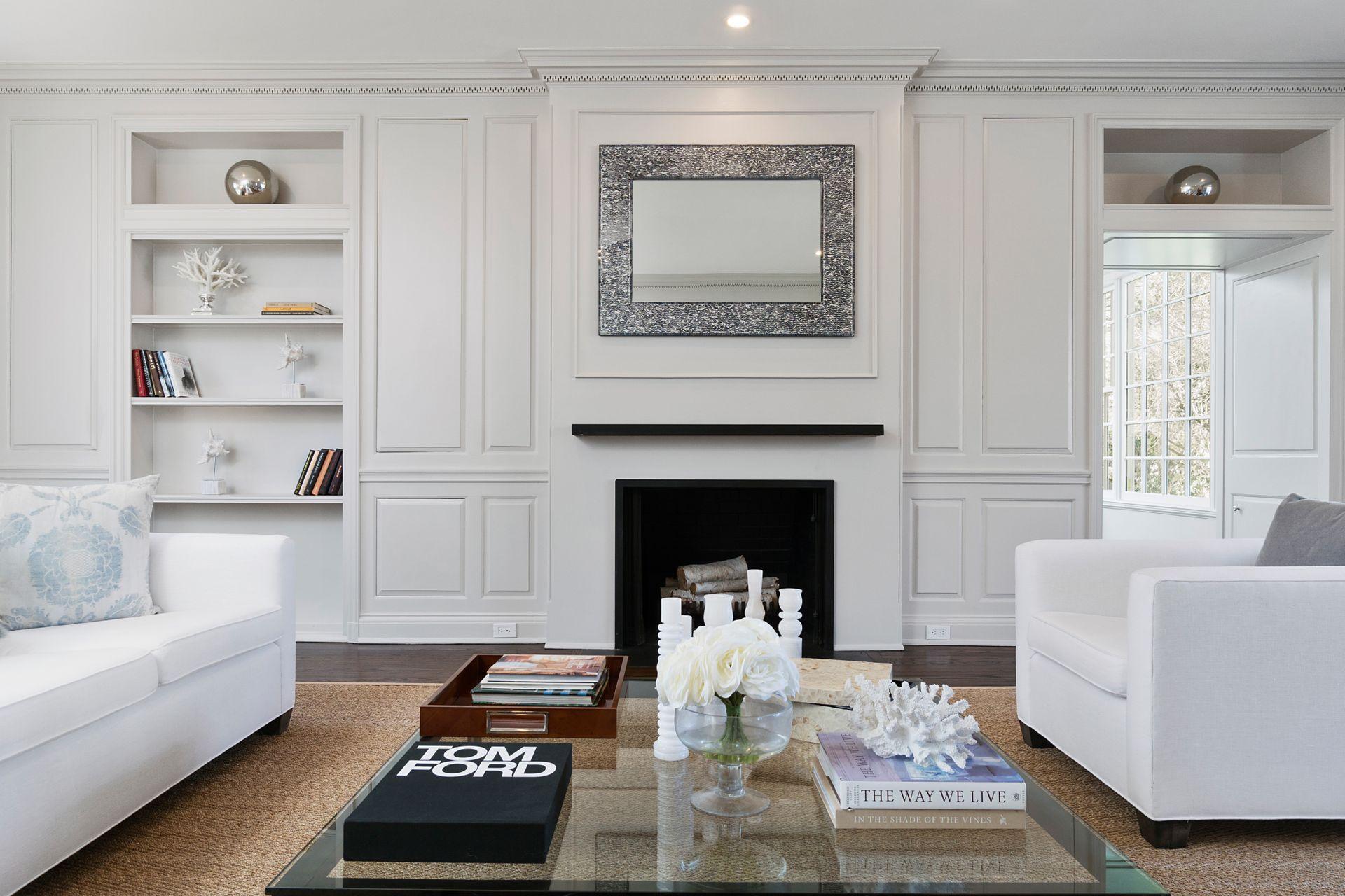 1102 Oenoke Ridge New Canaan, CT 06840 - Photo 4 of 49 a living room with furniture and a fireplace