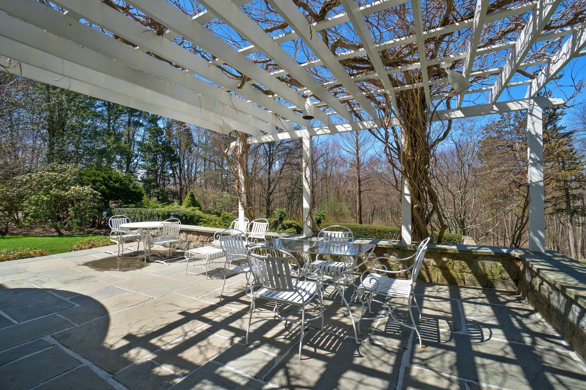 1102 Oenoke Ridge New Canaan, CT 06840 - Photo 45 of 49 a view of yard with patio