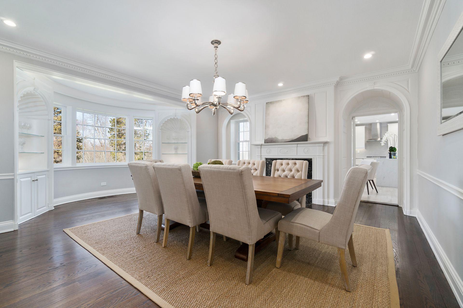 1102 Oenoke Ridge New Canaan, CT 06840 - Photo 6 of 49 a view of a dining room with furniture and wooden floor
