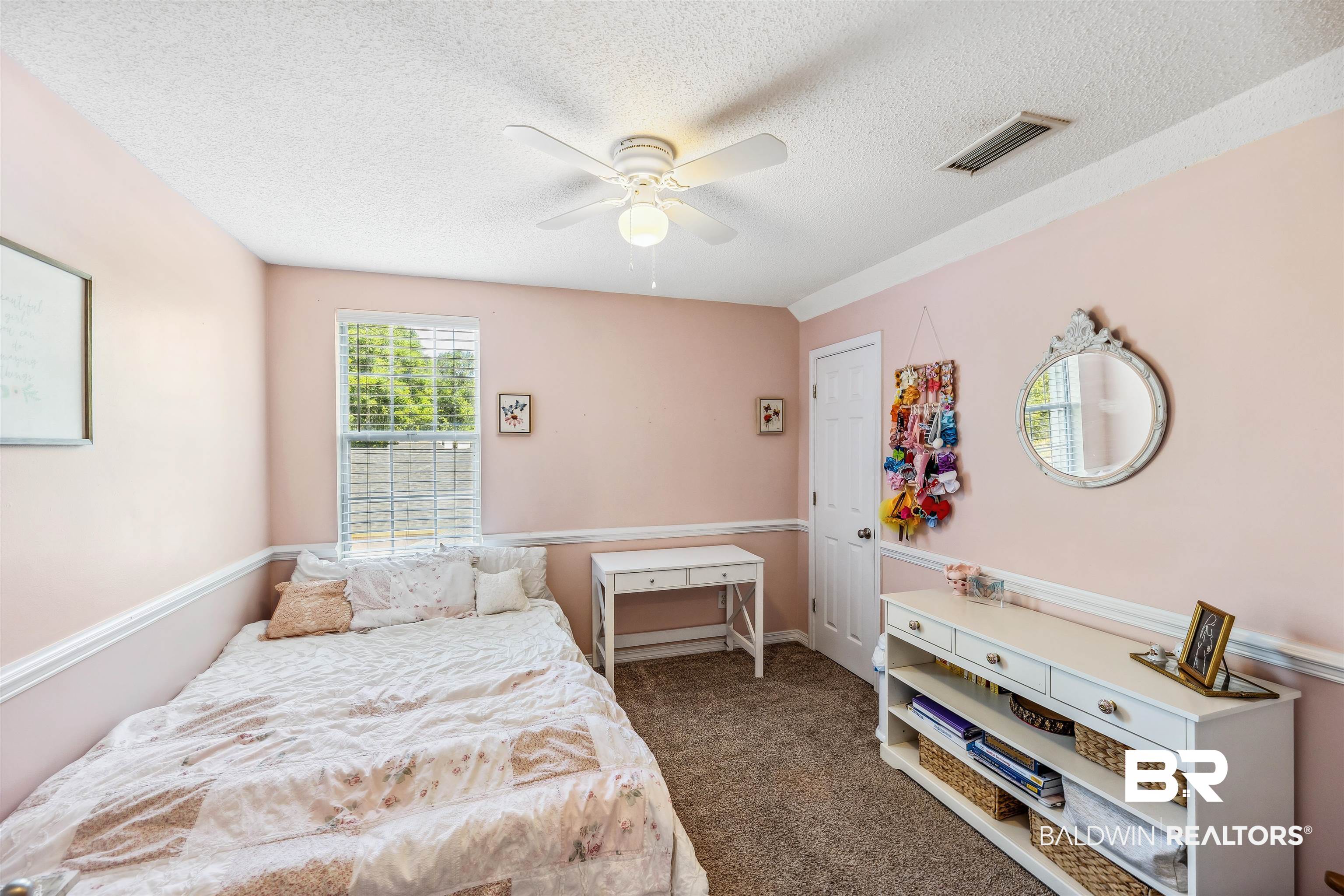 183 Richmond Road Daphne, AL 36526 - Photo 13 of 19 Bedroom with ceiling fan, a textured ceiling, visible vents, and carpet