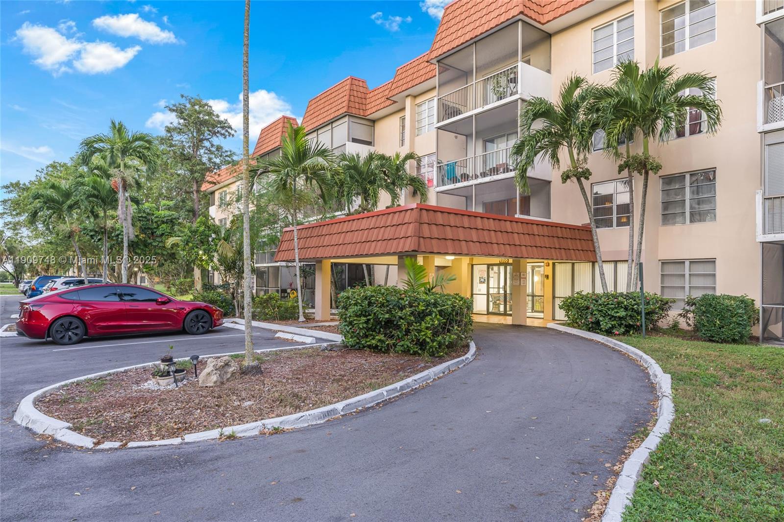 4166 Inverrary Drive, Unit 306 Lauderhill, FL 33319 - Photo 19 of 30 a view of a front of house with a street