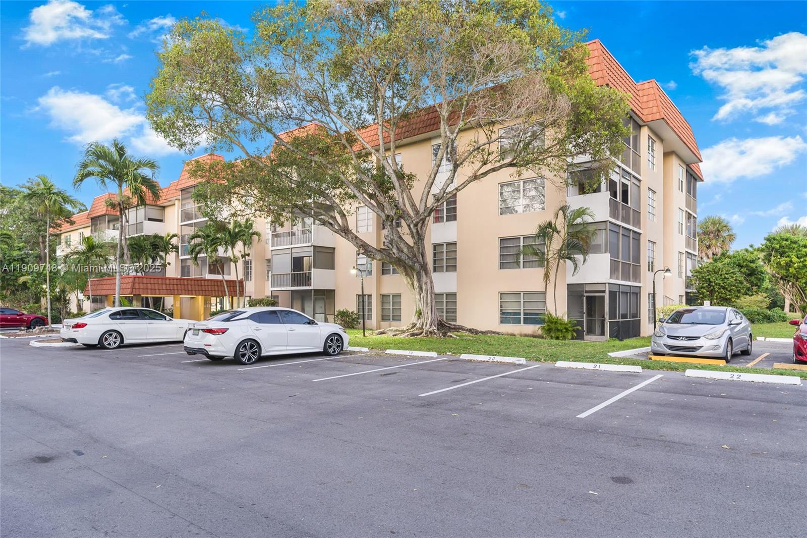 4166 Inverrary Drive, Unit 306 Lauderhill, FL 33319 - Photo 23 of 30 a view of street with parked cars