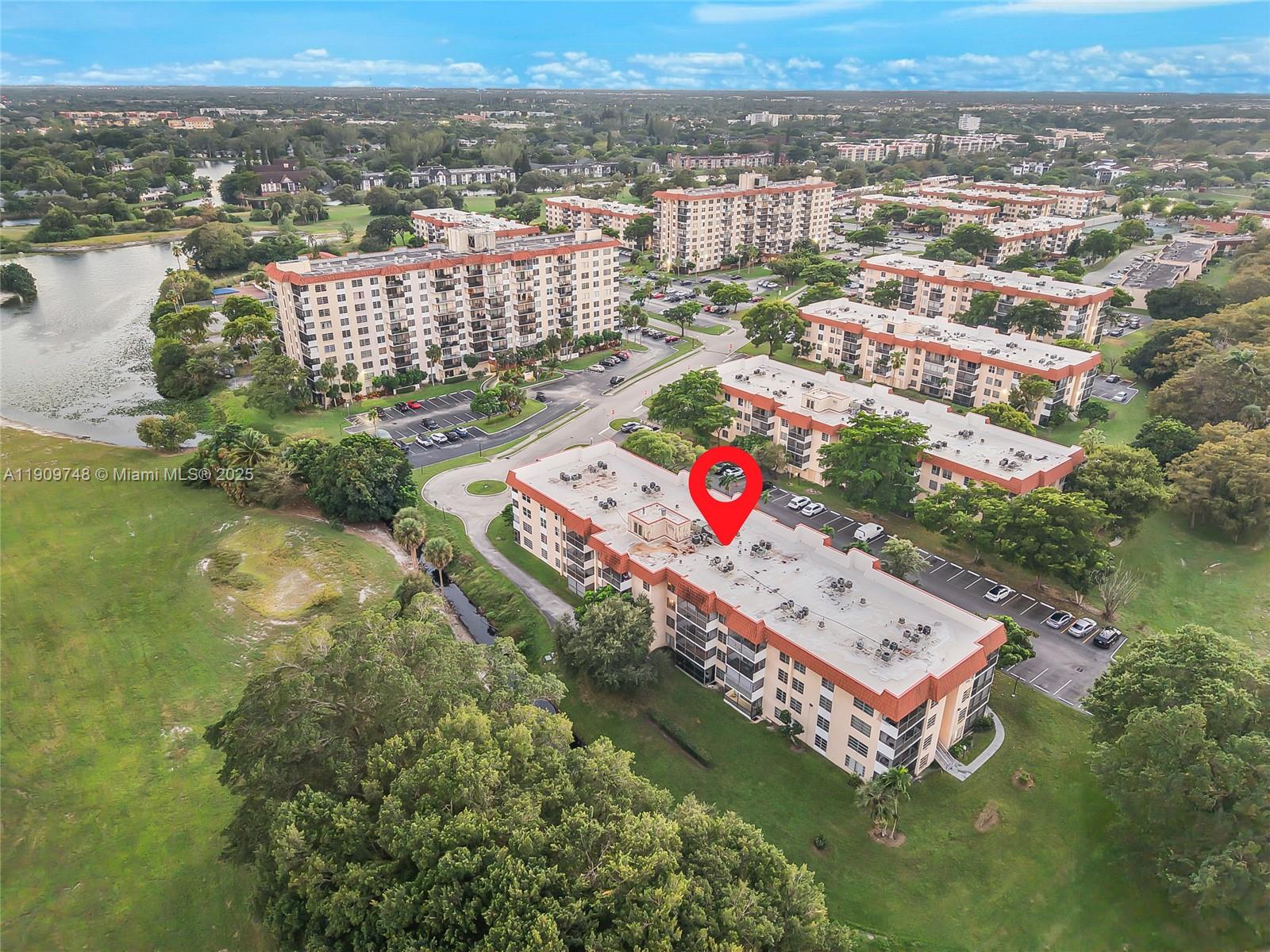 4166 Inverrary Drive, Unit 306 Lauderhill, FL 33319 - Photo 26 of 30 an aerial view of residential houses with outdoor space and river
