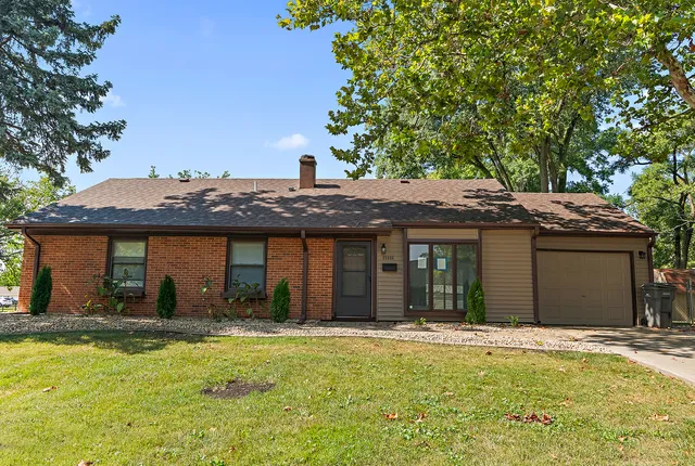 a house view with a garden space