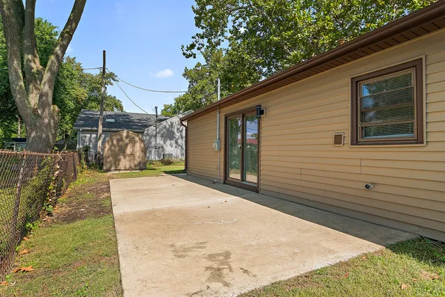 a view of a backyard of the house