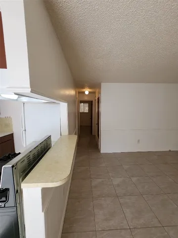 a view of hallway with washer and dryer