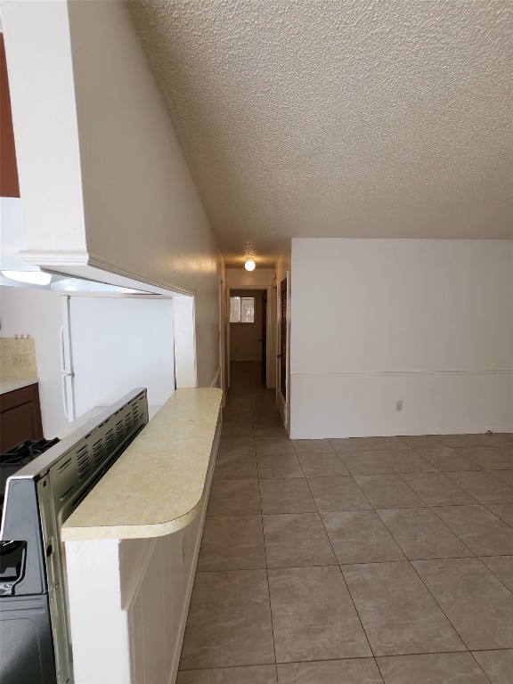 2404 Audubon Place, Unit B Austin, TX 78741 - Photo 11 of 23 a view of hallway with washer and dryer
