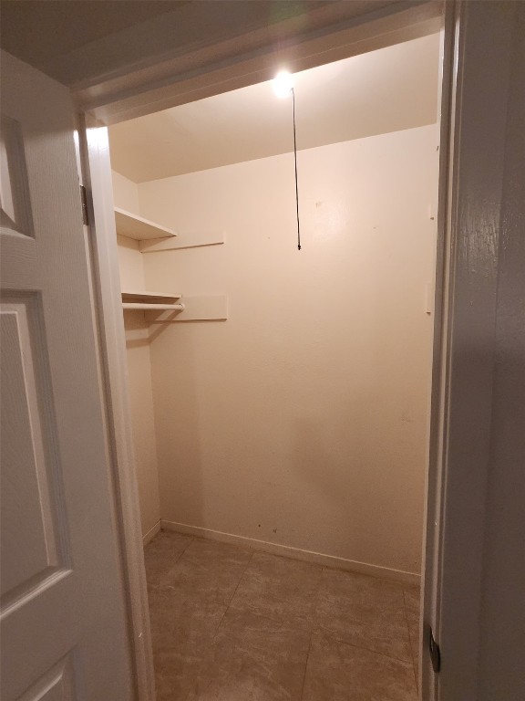 2404 Audubon Place, Unit B Austin, TX 78741 - Photo 17 of 23 a view of small space with racks on the wall