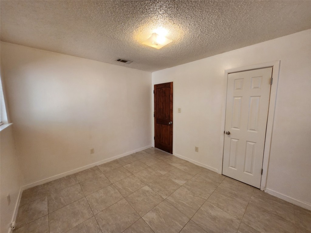 2404 Audubon Place, Unit B Austin, TX 78741 - Photo 23 of 23 a view of an empty room