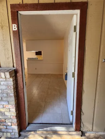 closeup view of a hallway with wooden floor