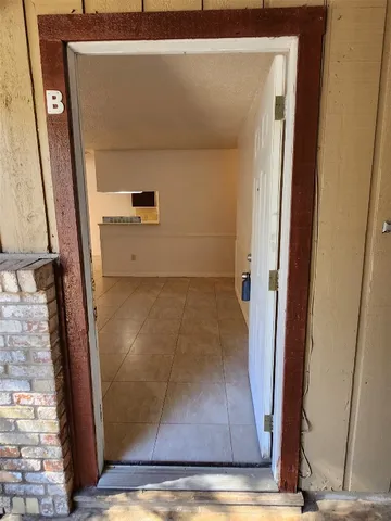 closeup view of a hallway with wooden floor