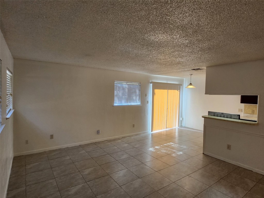 2404 Audubon Place, Unit B Austin, TX 78741 - Photo 6 of 23 a view of kitchen with natural light