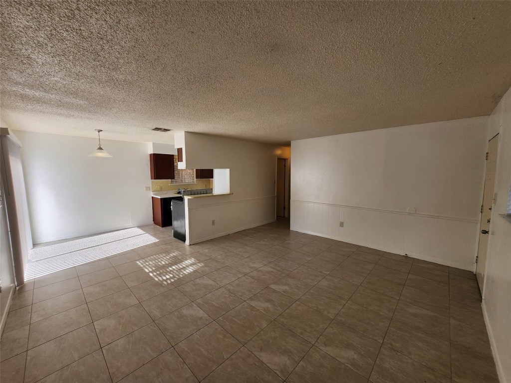 2404 Audubon Place, Unit B Austin, TX 78741 - Photo 7 of 23 a view of a kitchen with a sink