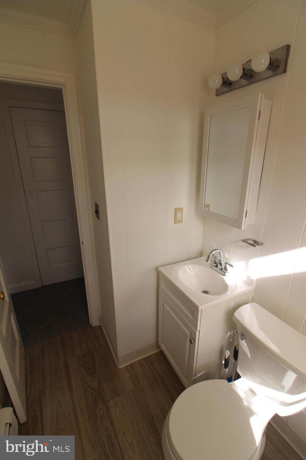 1 Pingree Court Ewing, NJ 08618 - Photo 11 of 31 a bathroom with a sink toilet and mirror