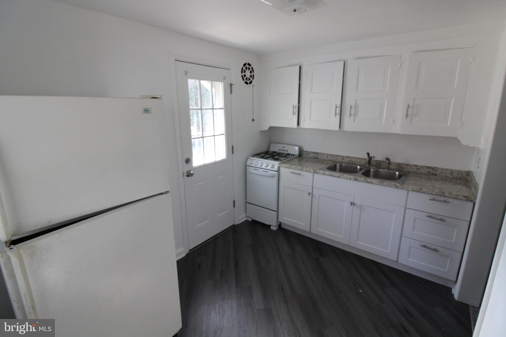 1 Pingree Court Ewing, NJ 08618 - Photo 12 of 31 a kitchen with a sink and cabinets