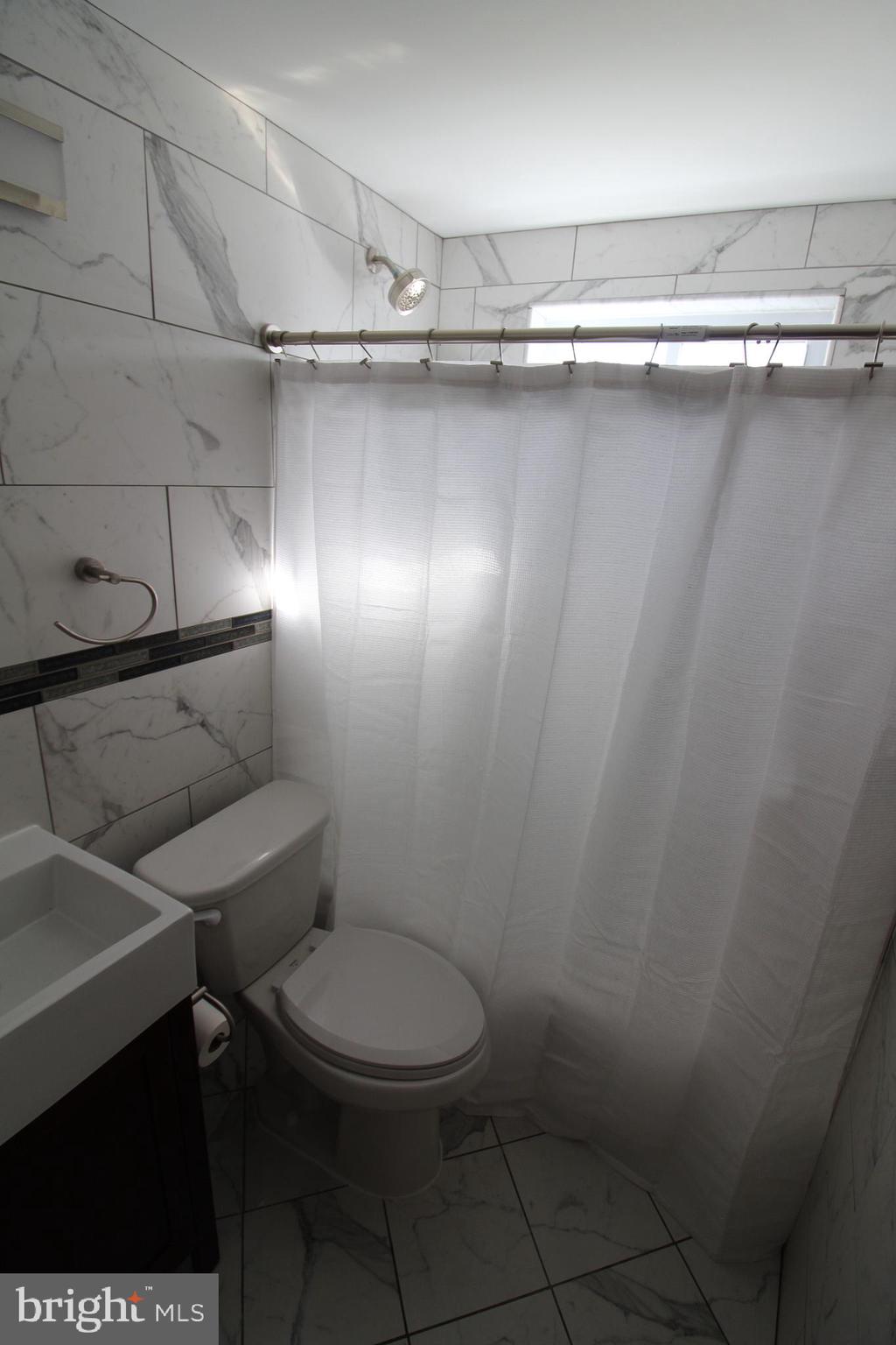 1 Pingree Court Ewing, NJ 08618 - Photo 20 of 31 a bathroom with a toilet and a sink