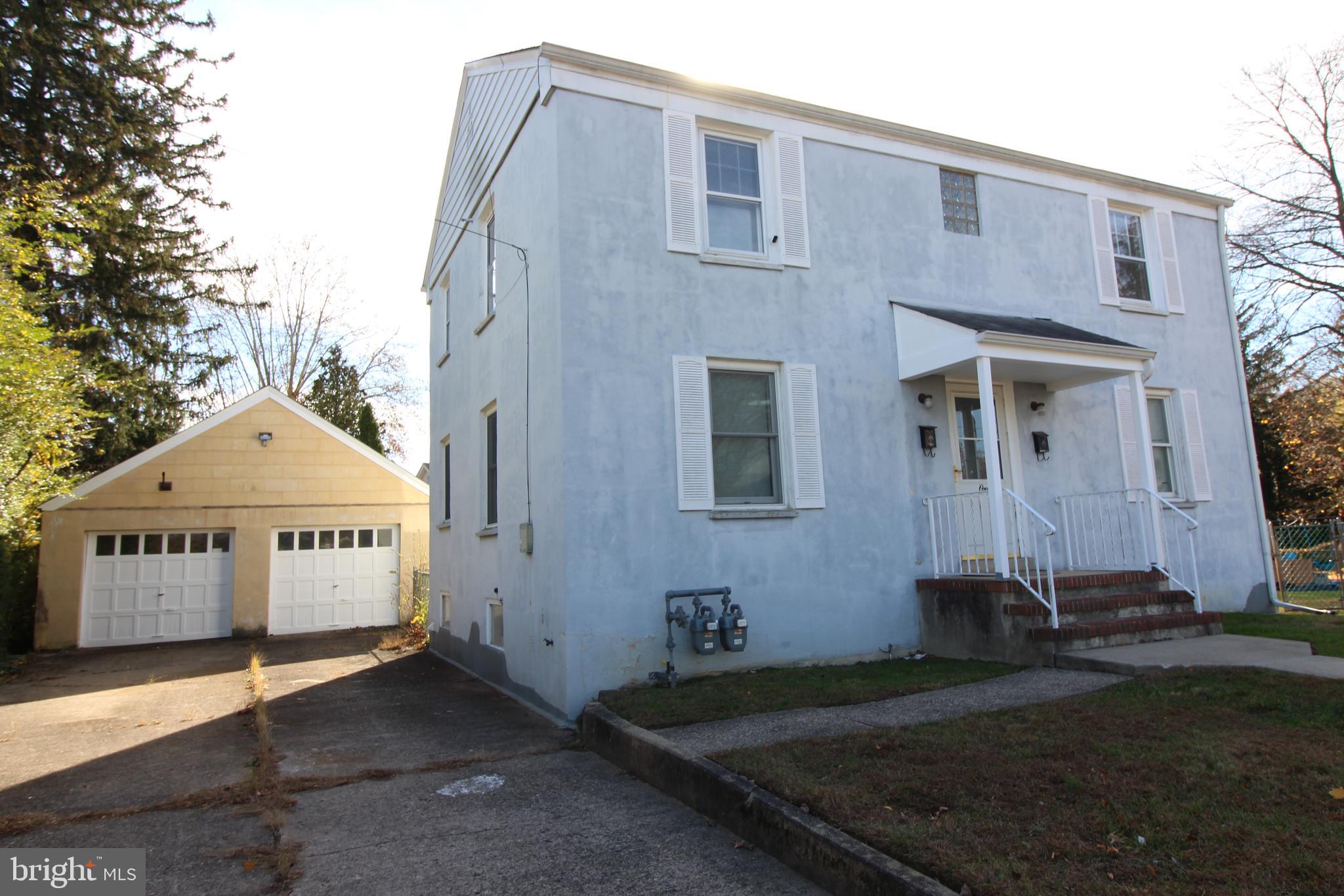 1 Pingree Court Ewing, NJ 08618 - Photo 2 of 31 a front view of a house with a yard