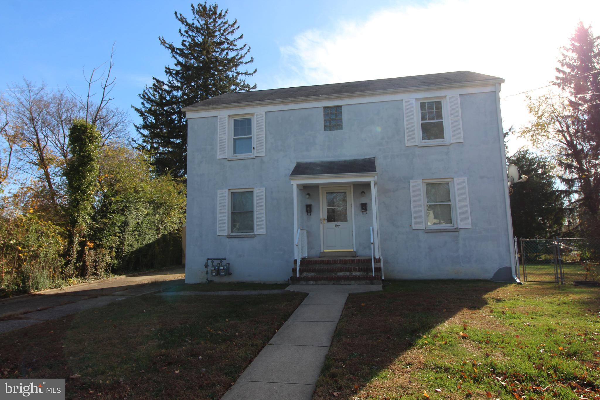 1 Pingree Court Ewing, NJ 08618 - Photo 3 of 31 a front view of a house with a yard
