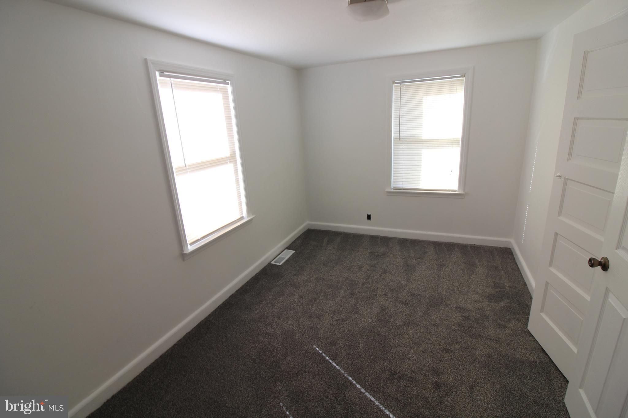 1 Pingree Court Ewing, NJ 08618 - Photo 8 of 31 an empty room with a window