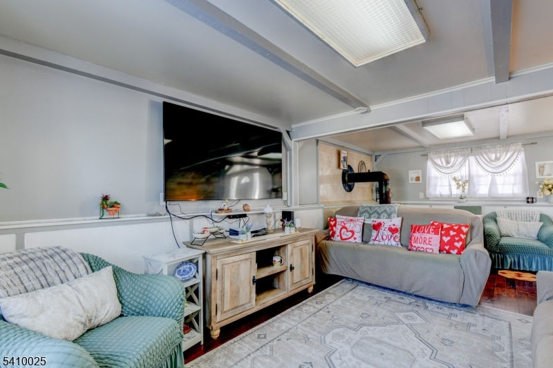 21 Normandy Circle Hopatcong, NJ 07843 - Photo 16 of 22 a bedroom with furniture and a couch