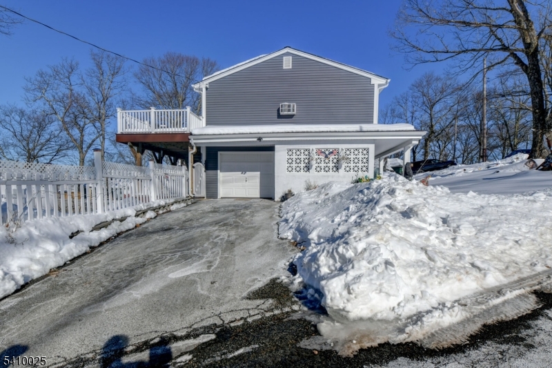 21 Normandy Circle Hopatcong, NJ 07843 - Photo 19 of 22 a front view of a house with a yard