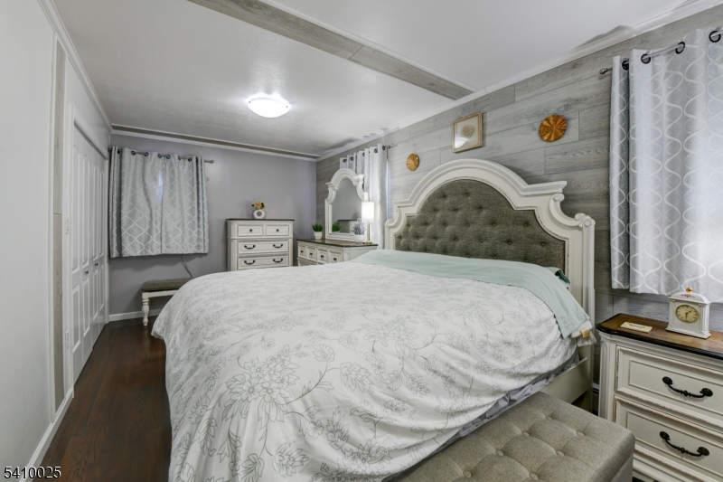 21 Normandy Circle Hopatcong, NJ 07843 - Photo 8 of 22 a bedroom with a bed and a dresser