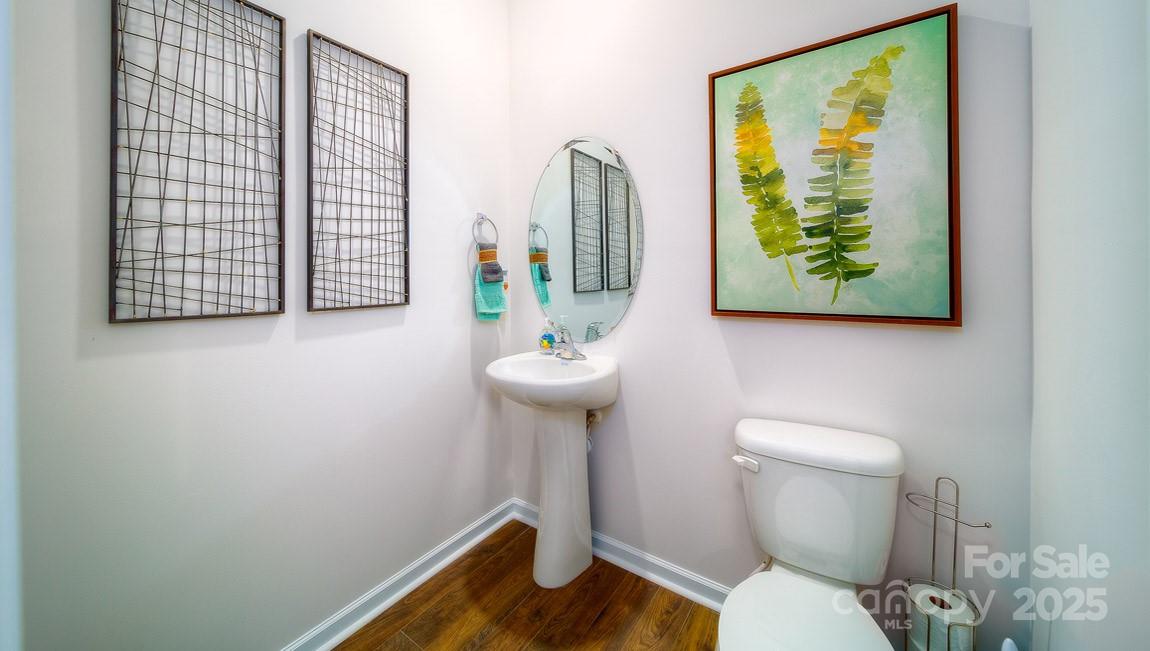 3948 Ashton Drive Northwest Conover, NC 28613 - Photo 15 of 17 a bathroom with a toilet a sink and mirror