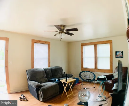 a work room with furniture and windows