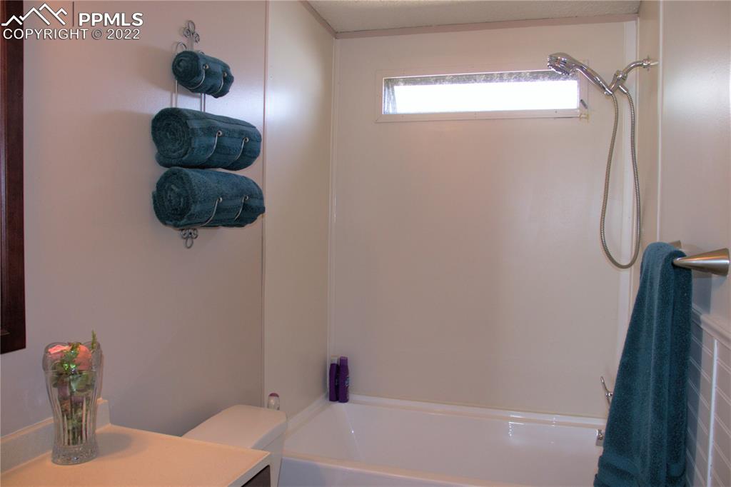 728 Graphite Street Florence, CO 81226 - Photo 16 of 30 a bathroom with a shower