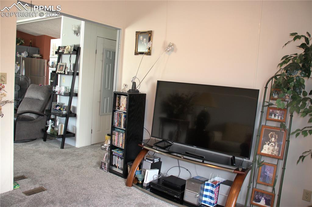 728 Graphite Street Florence, CO 81226 - Photo 18 of 30 a room with furniture and gym equipment