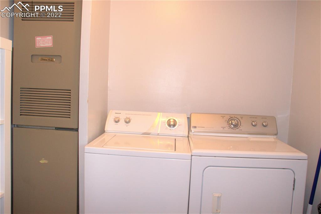 728 Graphite Street Florence, CO 81226 - Photo 20 of 30 a utility room with dryer and washer
