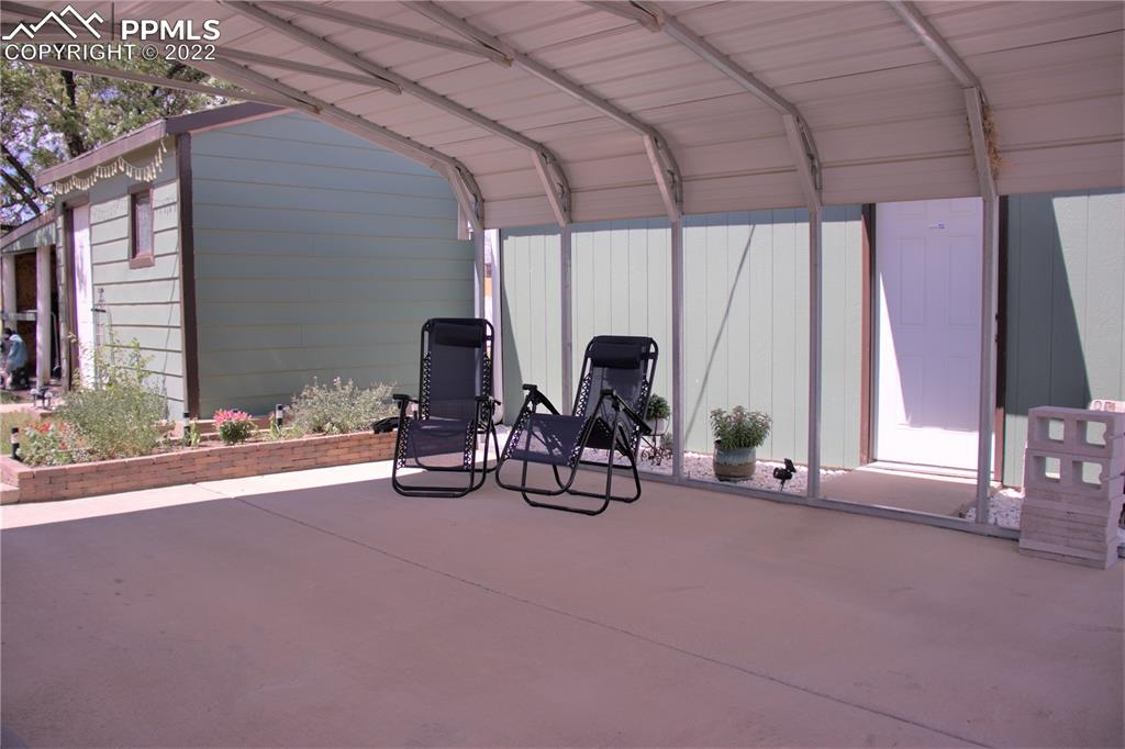 728 Graphite Street Florence, CO 81226 - Photo 26 of 30 a view of a room with gym equipment