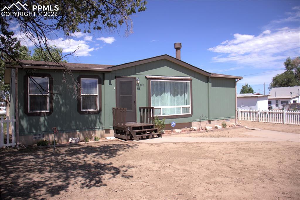 728 Graphite Street Florence, CO 81226 - Photo 30 of 30 a front view of a house