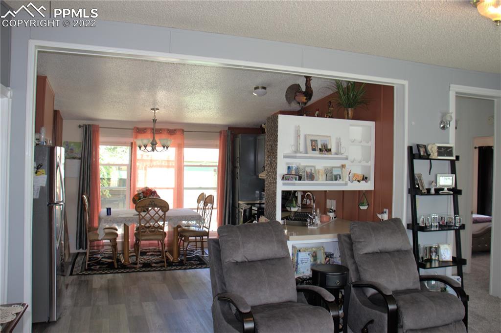 728 Graphite Street Florence, CO 81226 - Photo 6 of 30 a view of a livingroom with furniture and a window