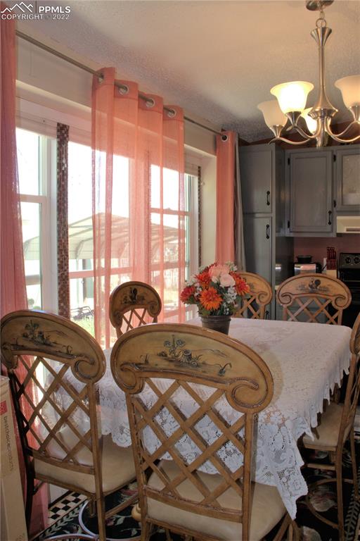 728 Graphite Street Florence, CO 81226 - Photo 8 of 30 a bedroom with two beds and a large window